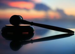 law gavel against blurred skyline sunset