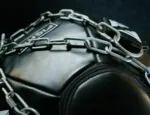 black leather weight ball wrapped in metal chains