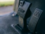 "stop and go" brake and gas pedals on a vehicle