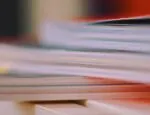 out-of-focus image of stacked books