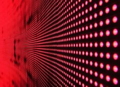 red dots lit up against a black background