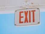 red and white exit sign