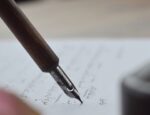 fountain pen writing a letter